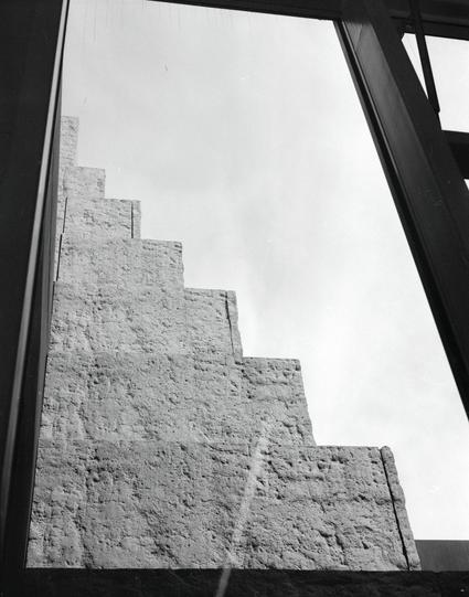 Ilford HP5 Plus 400 (6x7)

##English
Black and white photograph of an object viewed from below. The object has a textured surface and consists of multiple steps leading upwards. The steps are framed by a window on both sides. The perspective emphasizes the height and angle of the object.
##中文
黑白照片，从下方拍摄的物体。物体表面有纹理，由多个台阶向上延伸。物体透过窗框构图。透视角度强调了楼梯的高度和倾斜度。