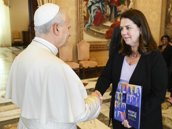 The Pope and an alum.
