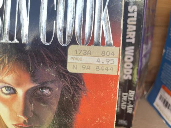 A paperback novel I found in a Little Library last weekend. I close-cropped the photo to the price tag on the cover, printed with a dot-matrix printer. The price is $4.95. I can’t remember if these were the price stickers used by B Dalton or by Waldenbooks, but it’s one of those two.

The book is Mortal Fear by Robin Cook. 