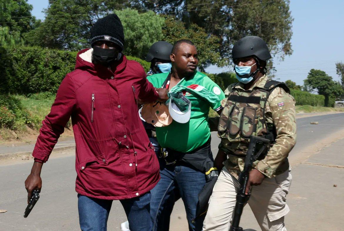 Nonuniformed and uninformed police officers arrest protester in Nanyuki
