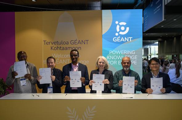 Group picture at the signing ceremony