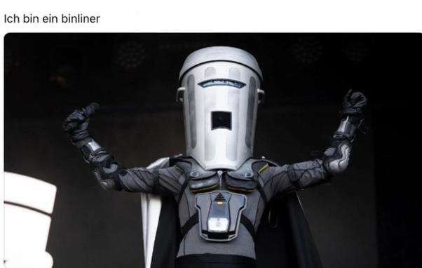 Image of candidate Binliner with caption, “Ich bin ein binliner”, which is a parody of a quote by President John F. Kennedy when he went to West Berlin in what was then East Germany and said, “ich bin ein Berliner”, which actually translated into saying he was a type of breakfast pastry.