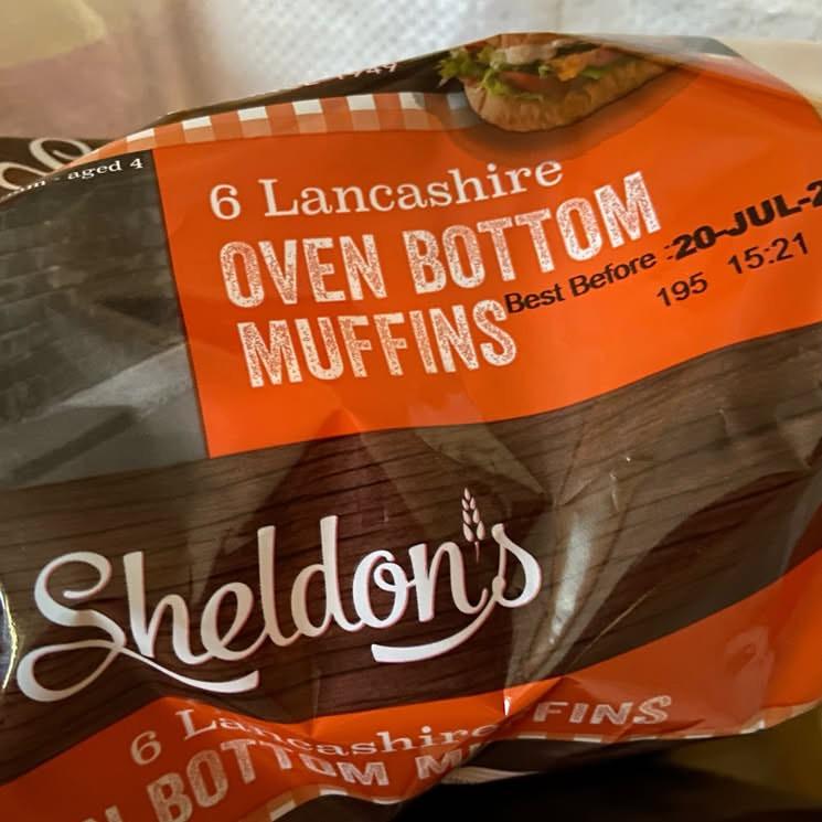 In the top of a shopping bag in my kitchen, a pack of six Sheldon's Lancashire Oven Bottom Muffins

(If you aren't from where I am from, they are not something you would recognise as a muffin. They are basically flattish bread rolls, but a lot softer than the item Americans erroneously call an English muffin)