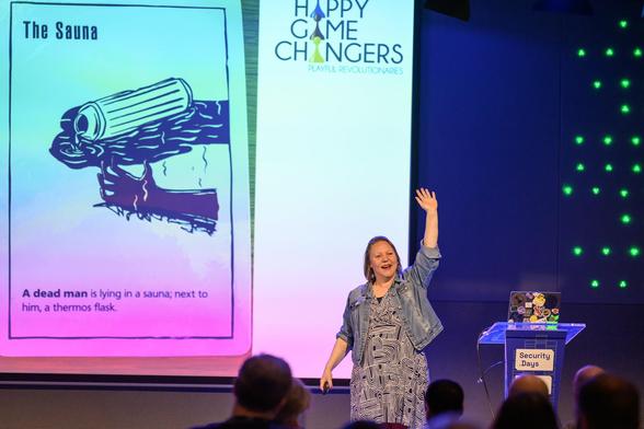 Woman on stage presenting