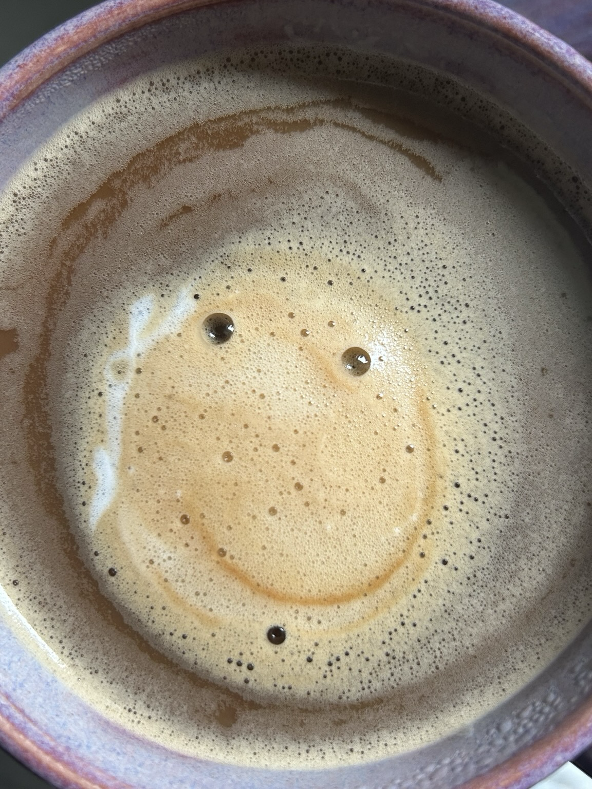 A smile in a cup of espresso