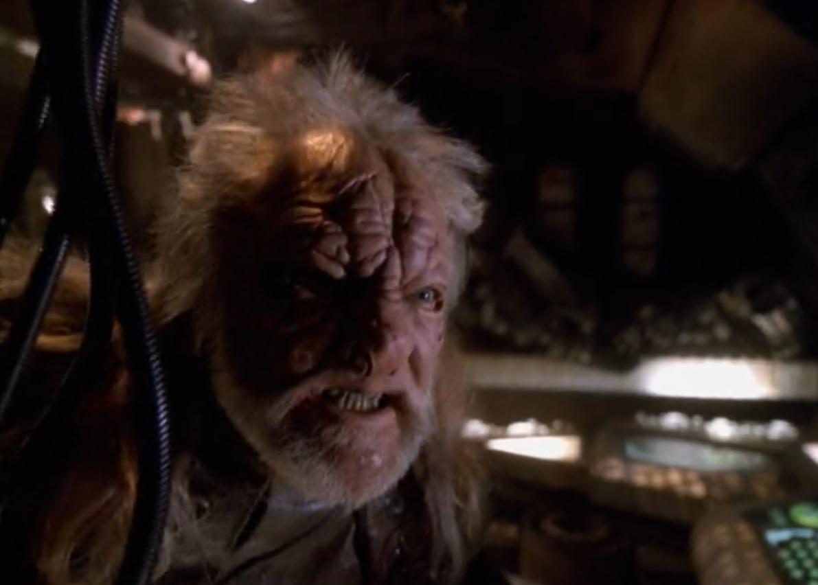W Morgan Sheppard, in makeup and prosthetics, playing an alien on Star Trek Voyager episode Bliss.