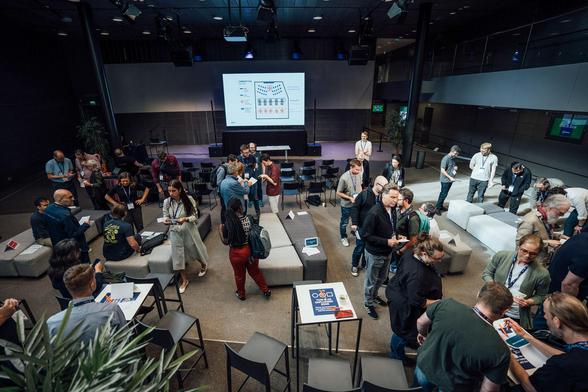 people moving within the space for a workshop