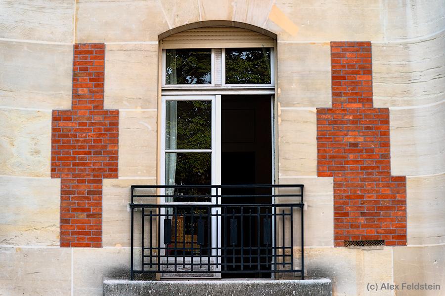 Paris window with brick accents o the sides