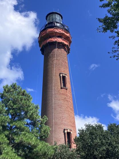 The Currituck Beach Lighthouse, an all brick edifice standing 162’ above ground. Construction is underway to repoint the one million bricks. 