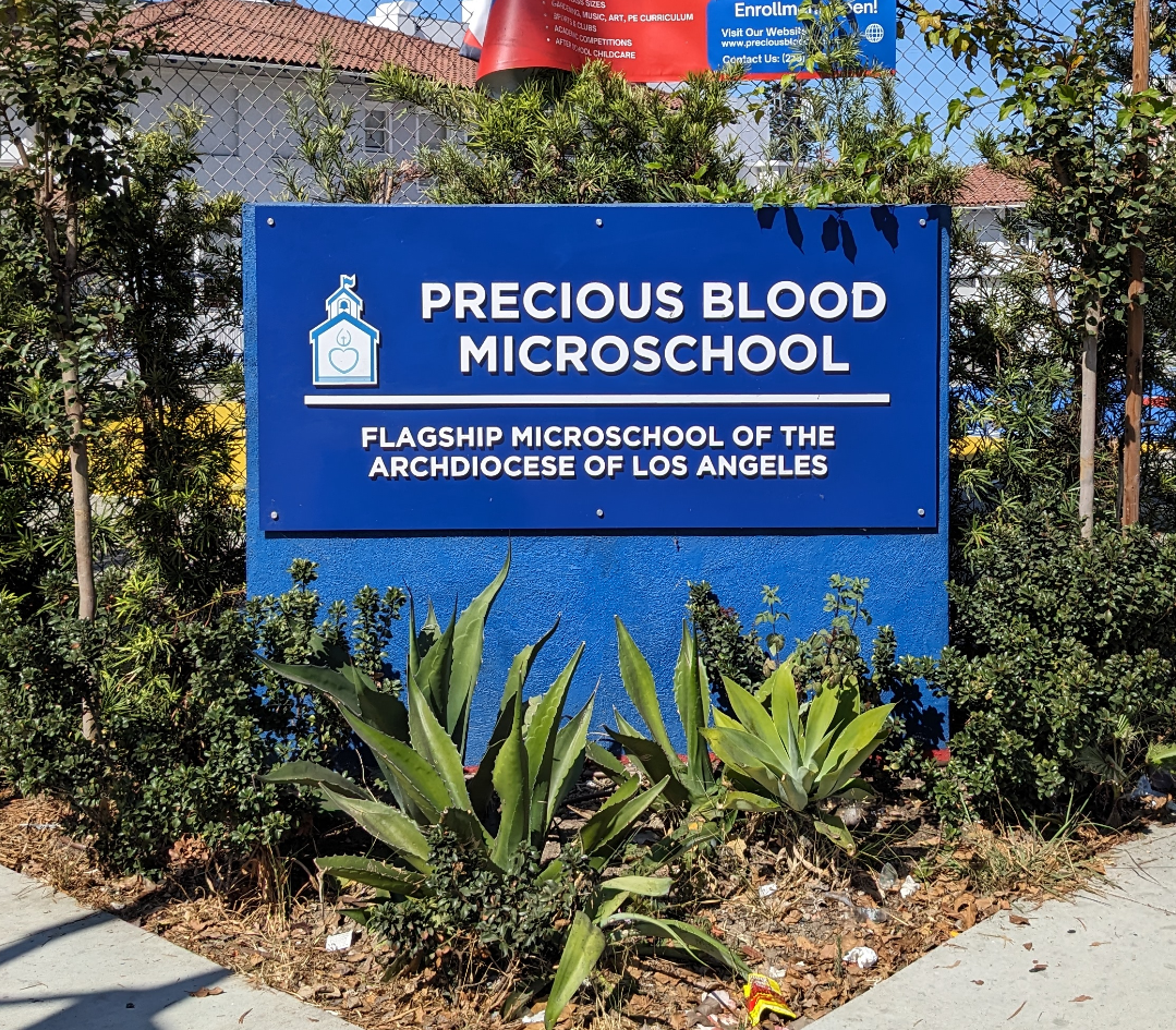 Sign says Precious Blood Microschool