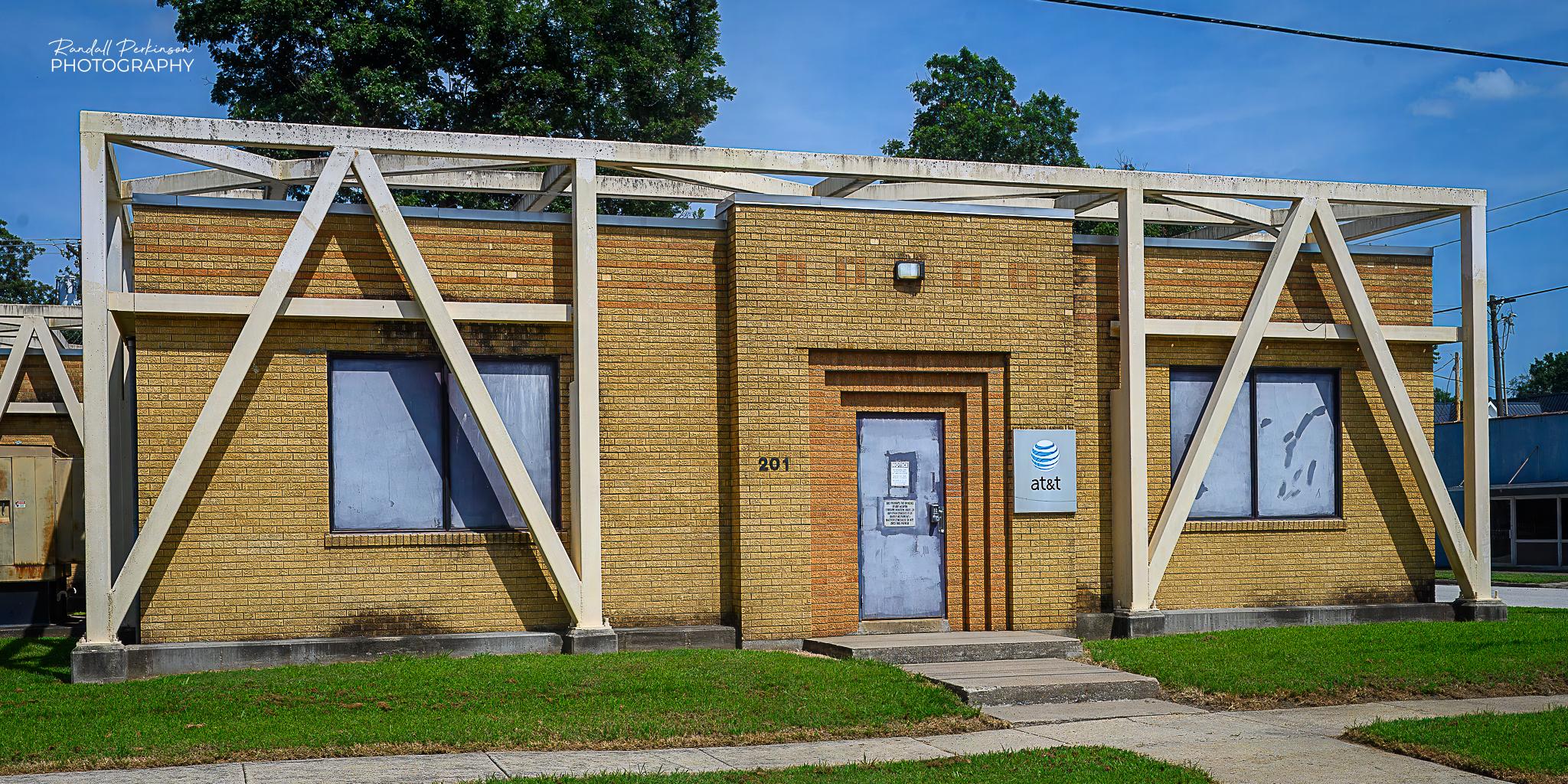 A one story brick telephone equipment building has an external steel frame built around it to help prevent its collapse during an earthquake.  Charleston is only about 25 miles from New Madrid where the largest earthquakes in this part of the US occurred more than 200 years ago.