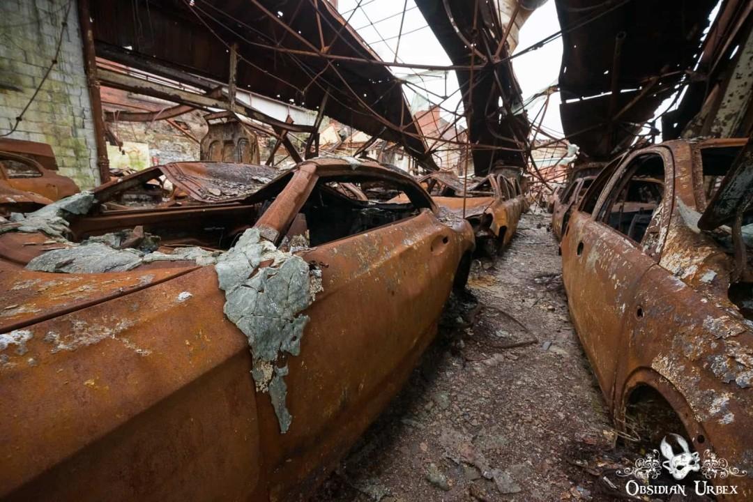 Rows of burnt cars, the glass has melted and slumped down from the car windows