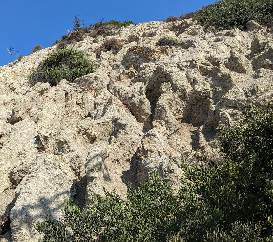 Eroded steep sandstone cliff