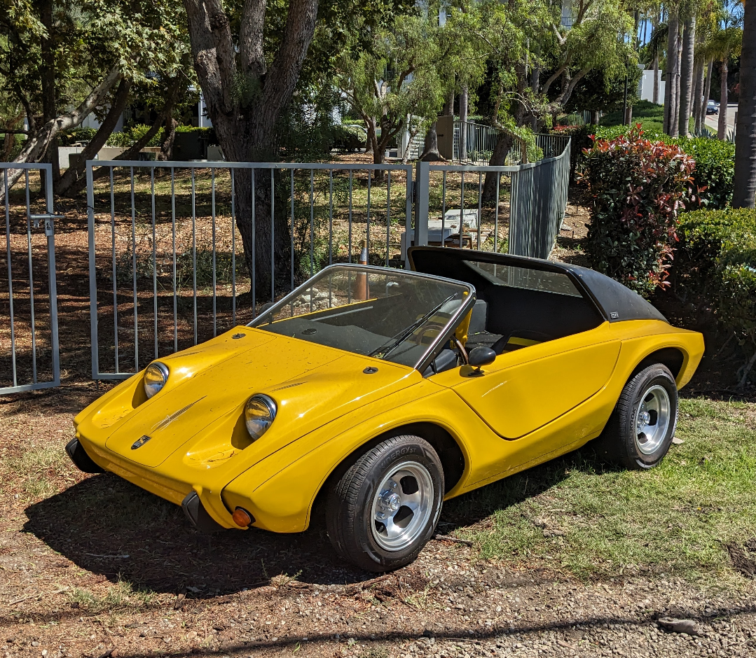 A bright yellow convertible.