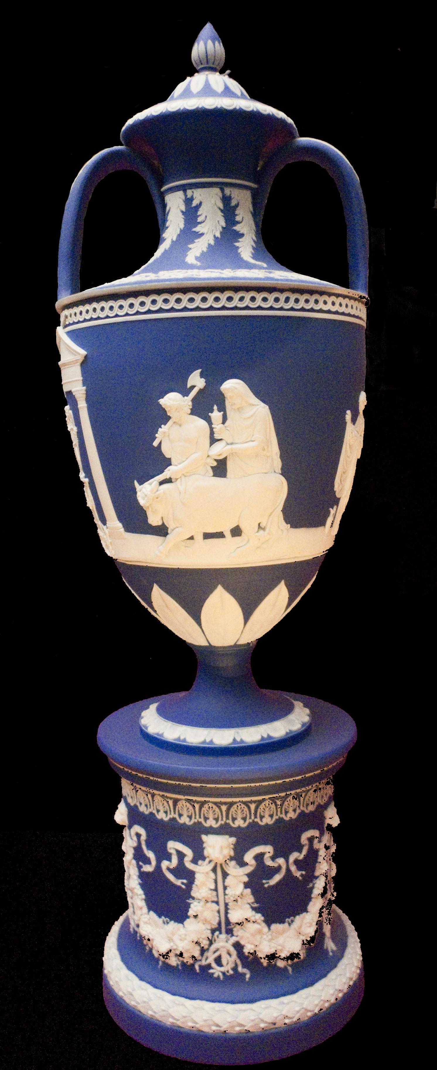Wedgwood blue jasperware exhibition vase and pedestal, likely from around 1850. Neoclassical style decoration in white bisque. 

DMC-LX3
ISO: 400
Shutter Speed: 1/15
Aperture: 2.2
Focal Length: 6.3 mm

GPS Position: 51 deg 29' 47.95" N, 0 deg 10' 19.99" W
V&A Museum, London, V&A Museum, England, United Kingdom

2011:03:16 15:12:35
Copyright: Matthew Malthouse ©  2011