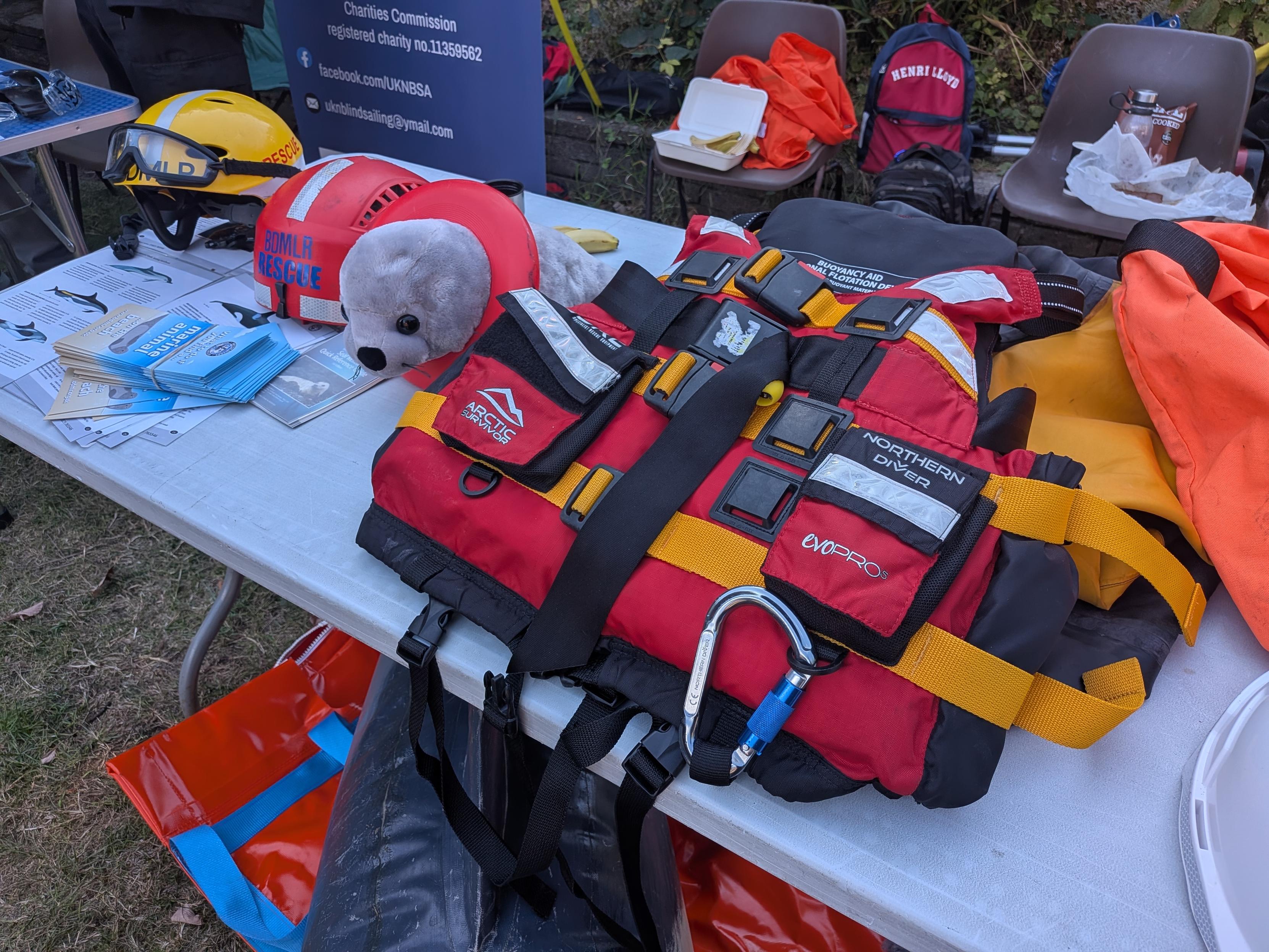 stall with seal toy, life jackets and helmets