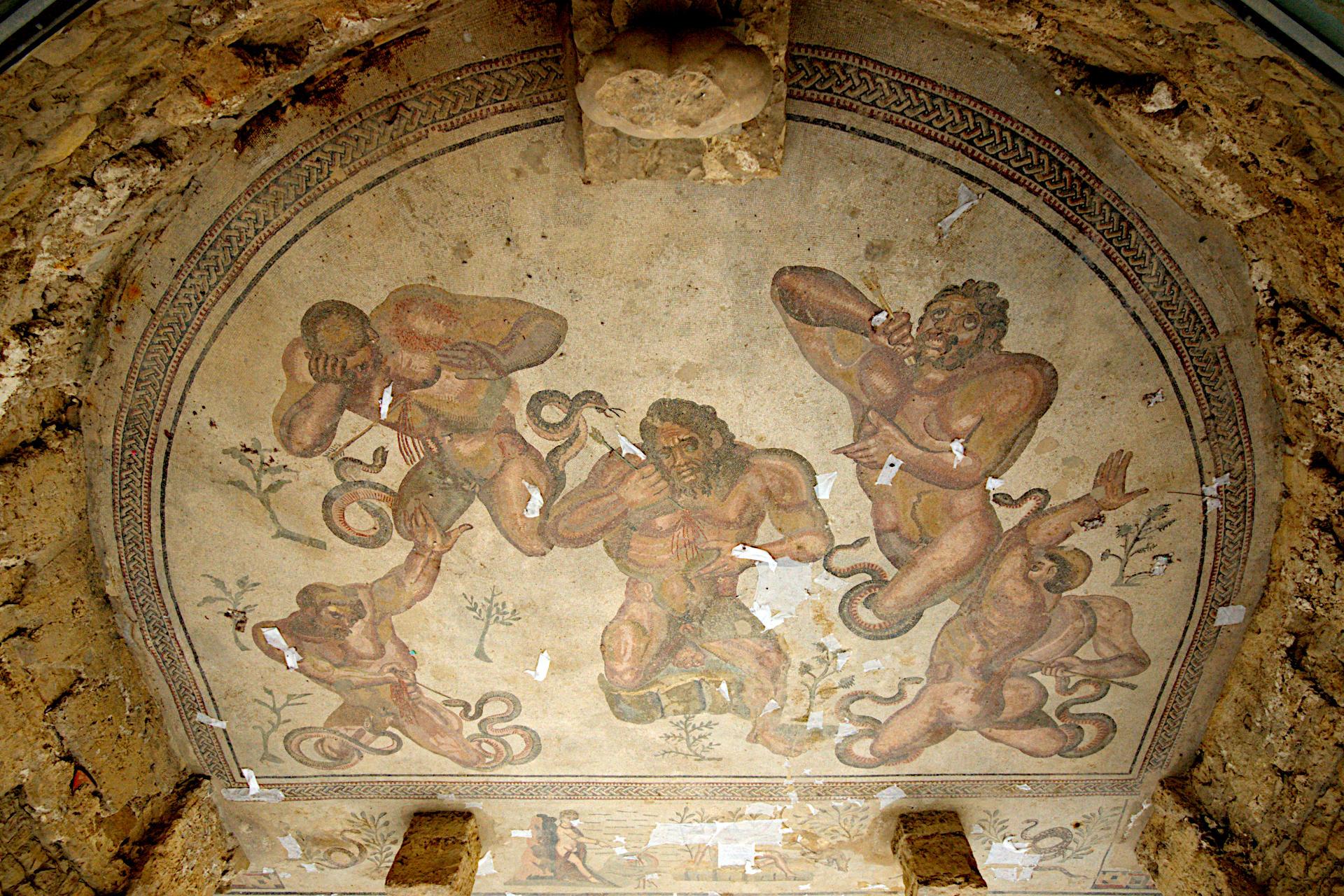 Mosaic floor depicting the defeat of the Gigantes, shot by Hercules's poisoned arrows. Eastern apse of the triclinium of the Villa Romana del Casale, Piazza Armerina, Sicily. Early 4th century CE.

Canon EOS 400D DIGITAL
ISO: 200
Shutter Speed: 1/250
Aperture: 11.0

Lens: 10.0 - 20.0 mm
Focal Length: 10.0 mm (35 mm equivalent: 16.2 mm)
Hyperfocal Distance: 0.49 m
Depth Of Field: inf (0.40 m - inf)
Field Of View: 96.1 deg

GPS position: 37 deg 21' 51.8" N, 14 deg 20' 06.0" E

2007:04:30 09:20:21
Copyright: © Matthew Malthouse 2007