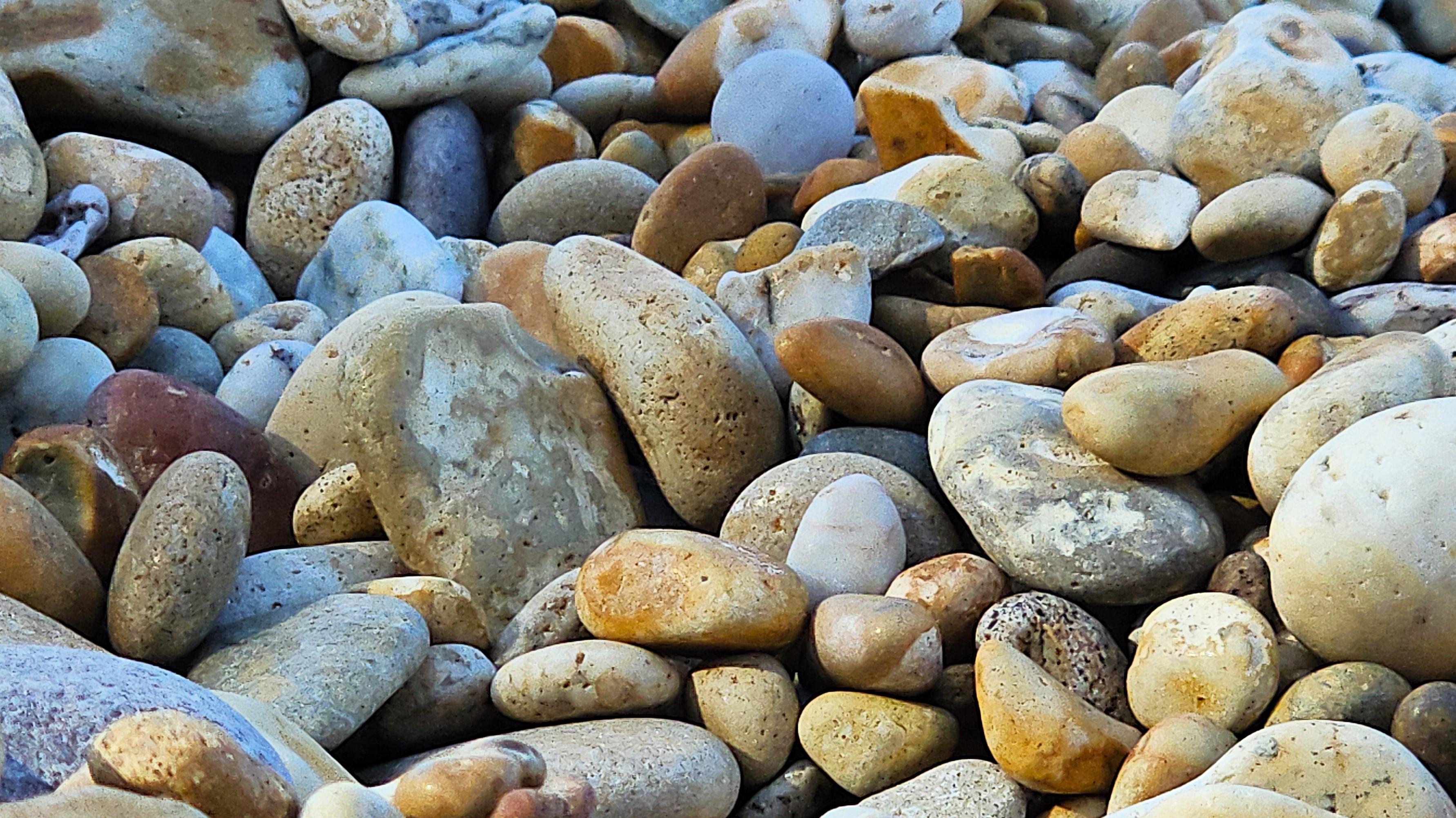 Close-up of stones on a beach.