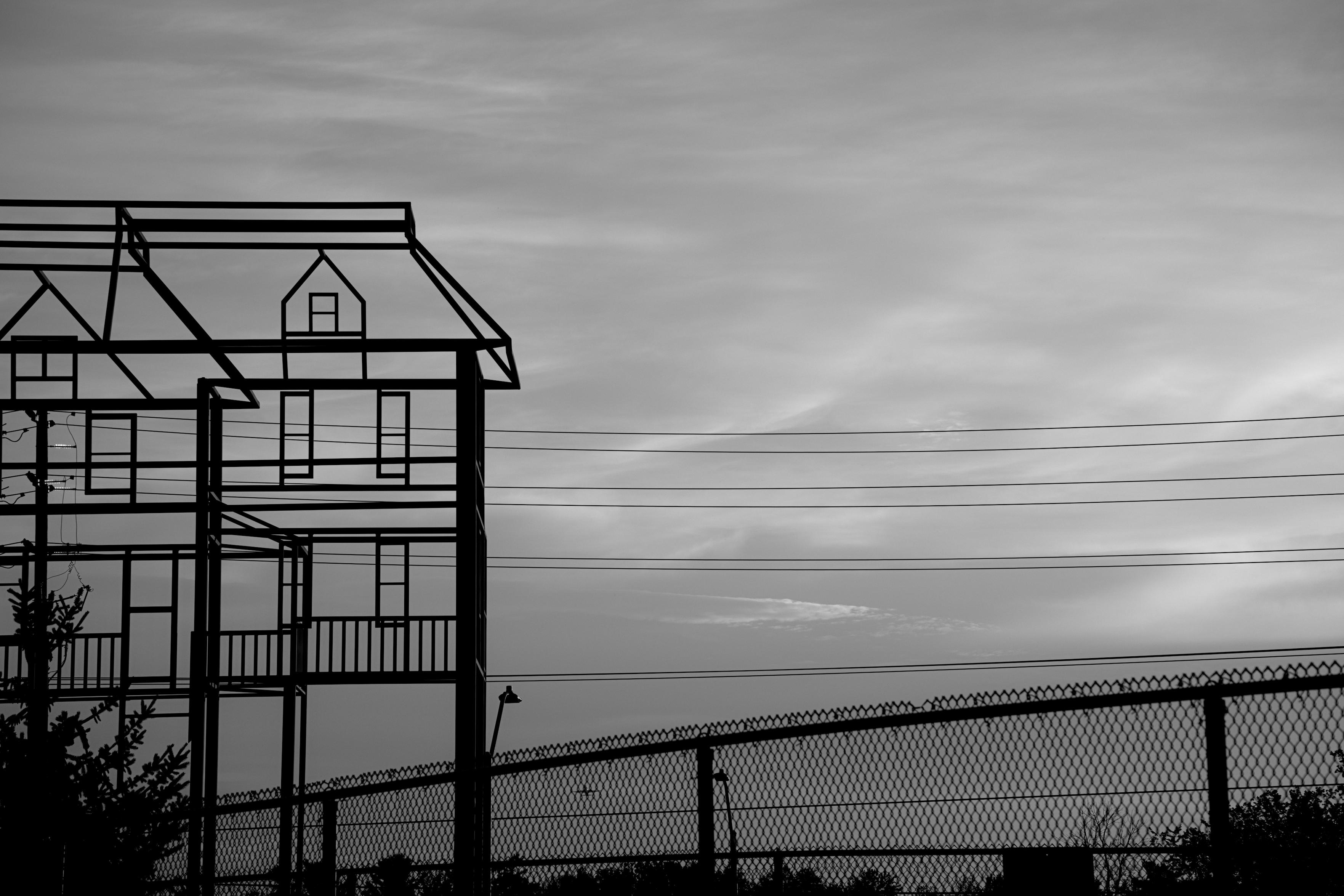 Some public art along Greenbank Road. And a fence.