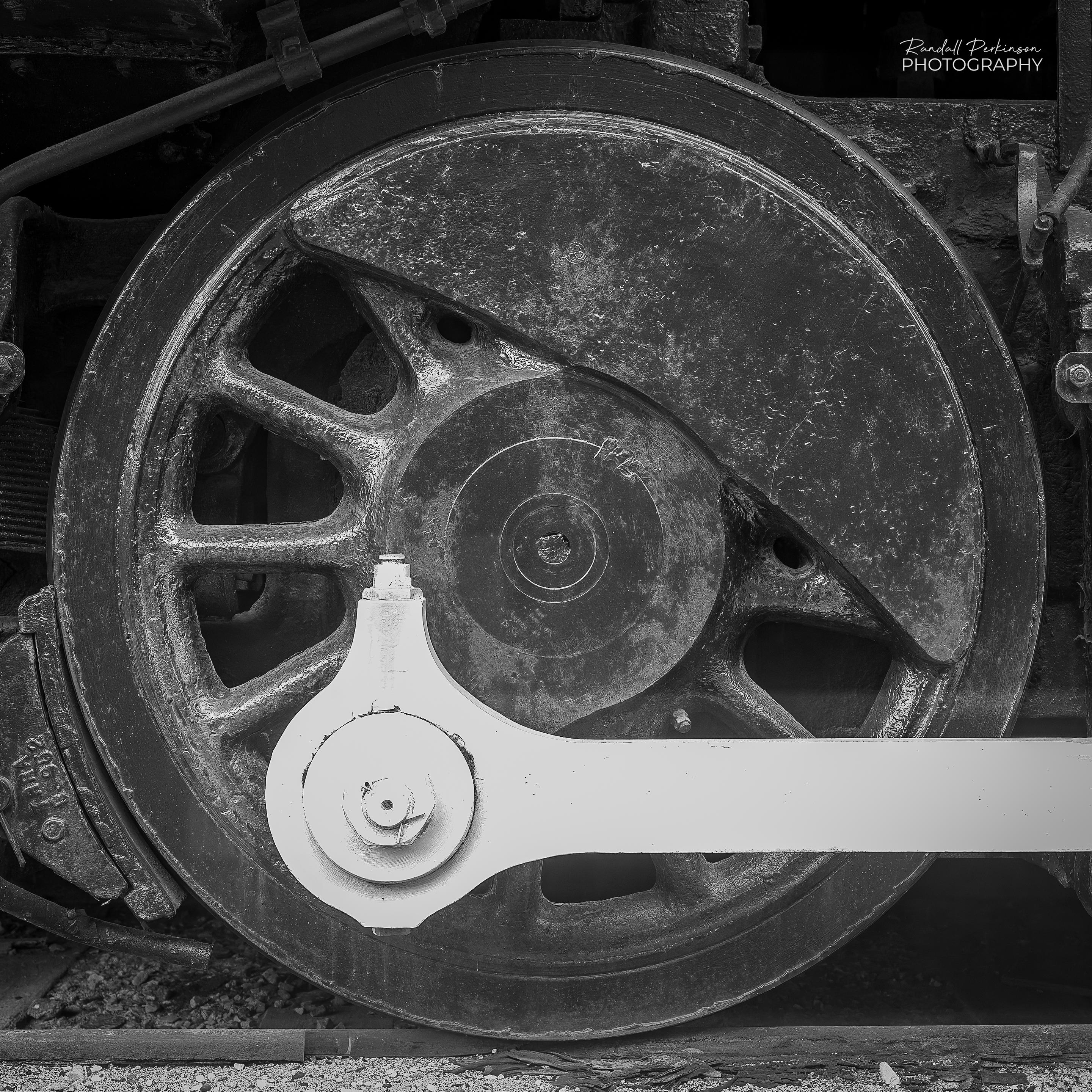 Photo of a single large locomotive drive wheel.