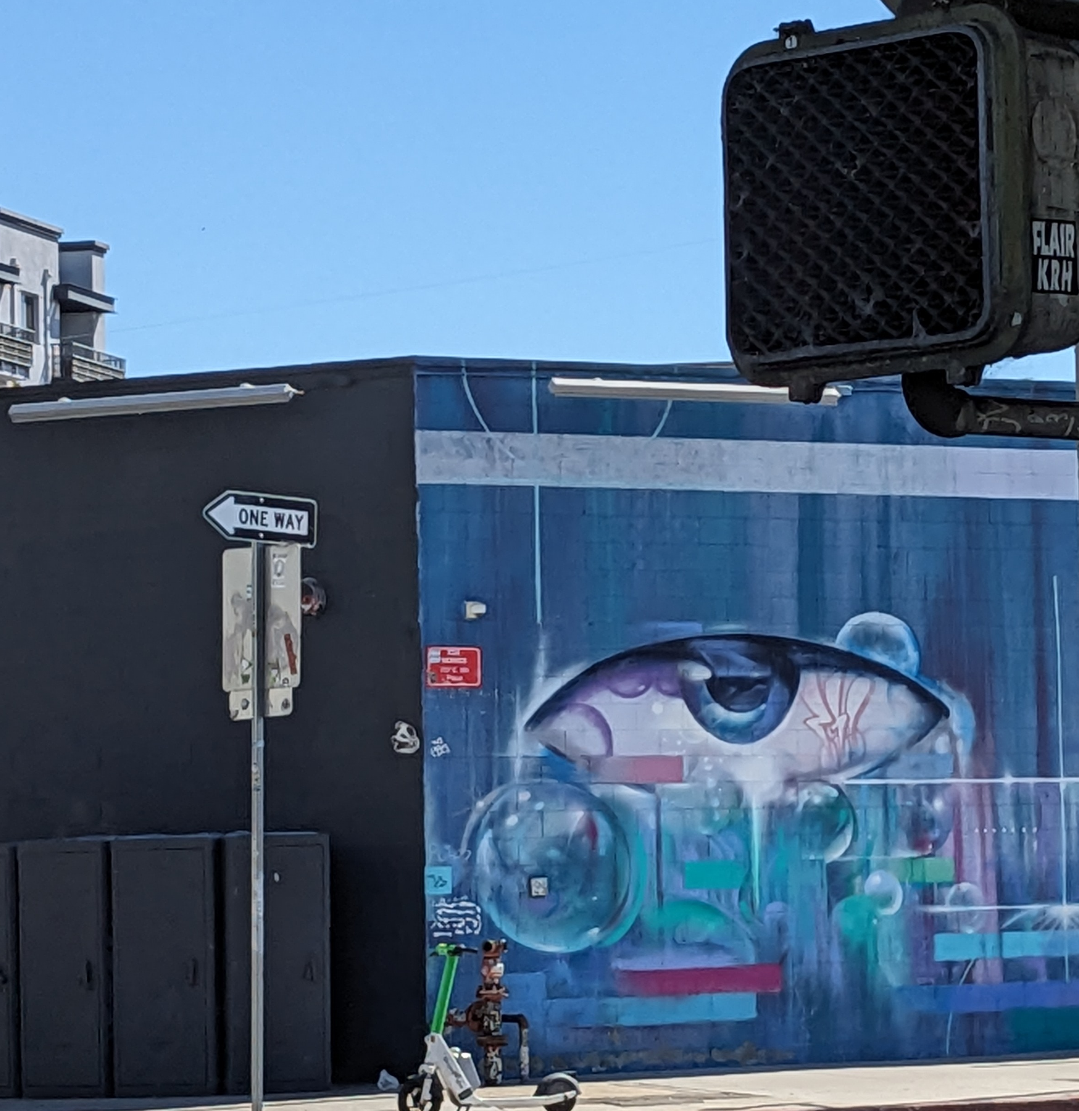 Mural section. there's a disembodied eye looking at the camera