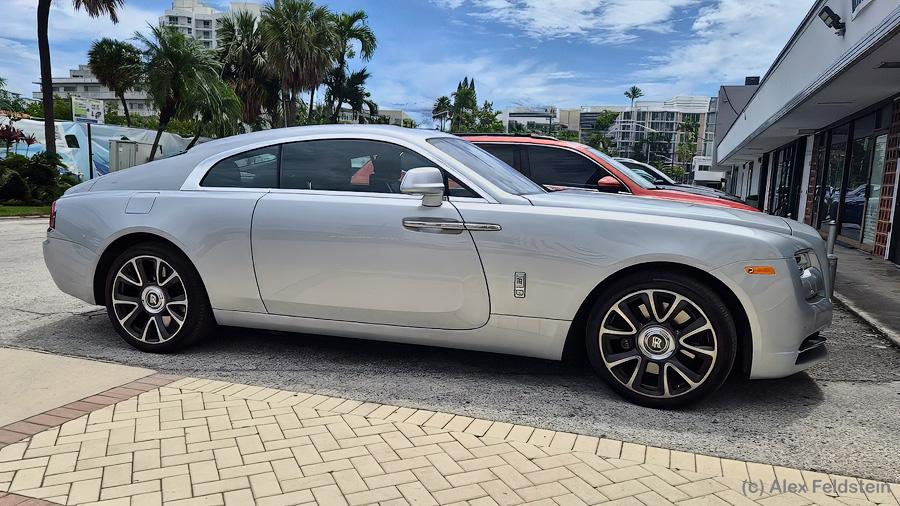 Silver Rolls-Royce Wraith parked