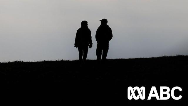 Two people walking