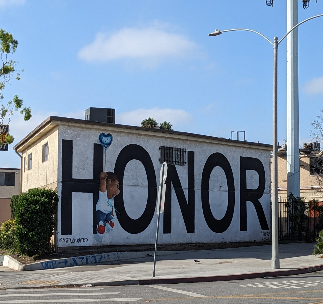 Mural around a large black on white HONOR