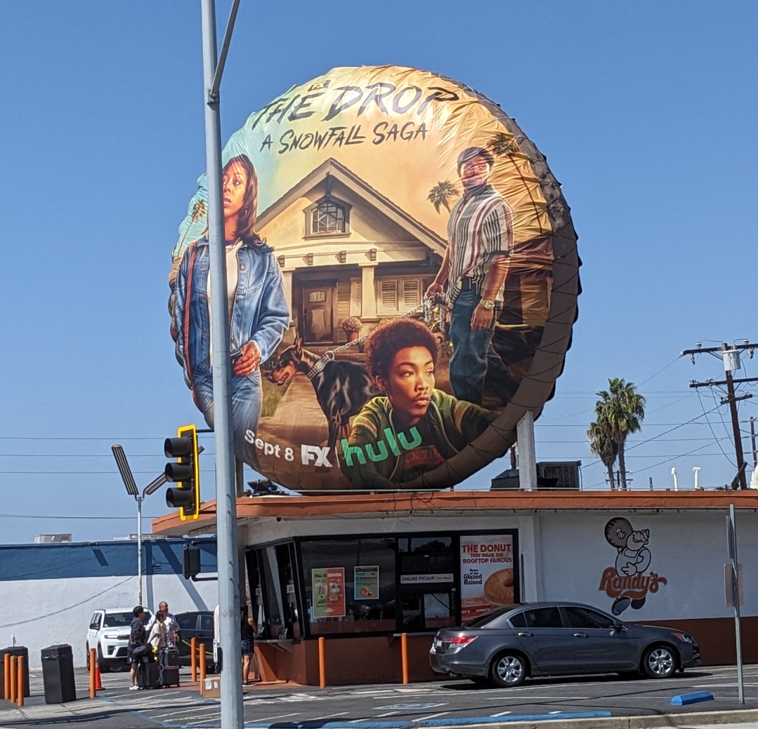 Giant Doughnut at Randy's Donuts in an advertising wrap