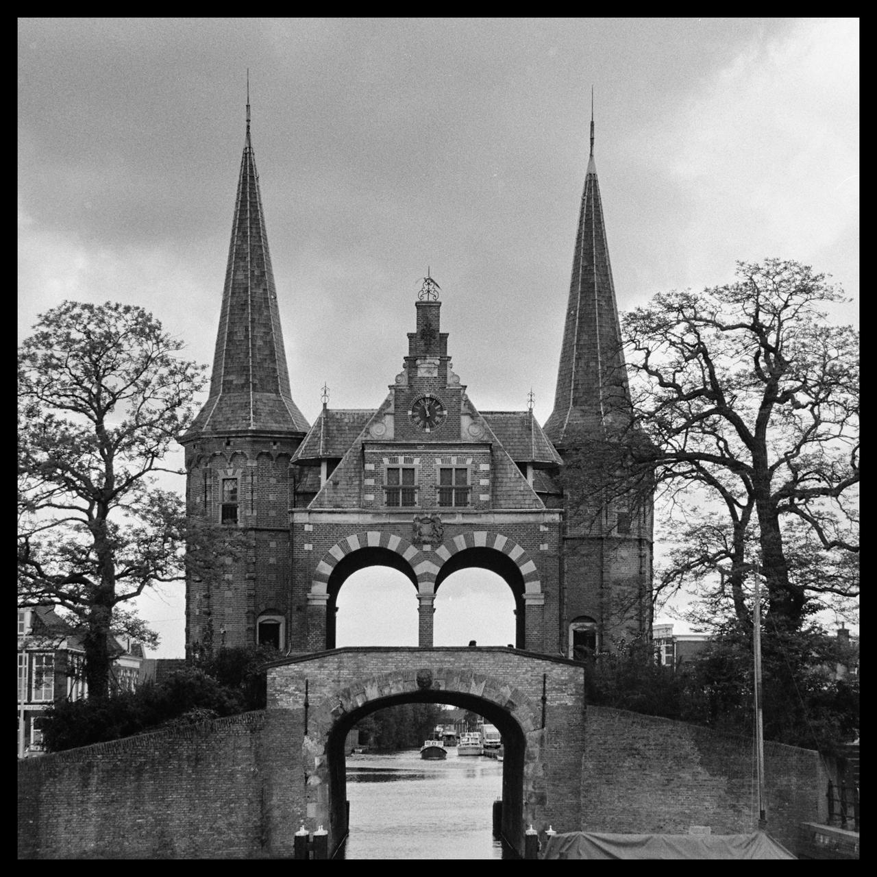 The Waterpoort or Hoogendster Pijp is a water gate, a gate in a defensive wall that connects a city to a waterway. It is situated in Sneek, the Netherlands. First parts are from 1492.

I shot this somewhere in the early 90s.

Camera: Nikon F801s
Lens: Nikkor AF 85mm f/1.8D
Film: Ilford HP5