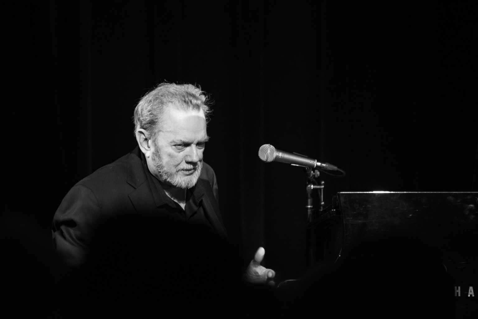 Jimmy, looking like he is channeling Orsen Welles, tells a tale of his father, a WWII marine turned Baptist minister.