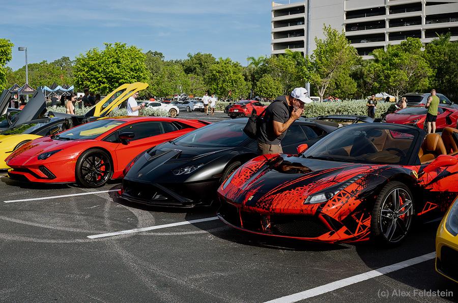 Several Ferraris at a car show