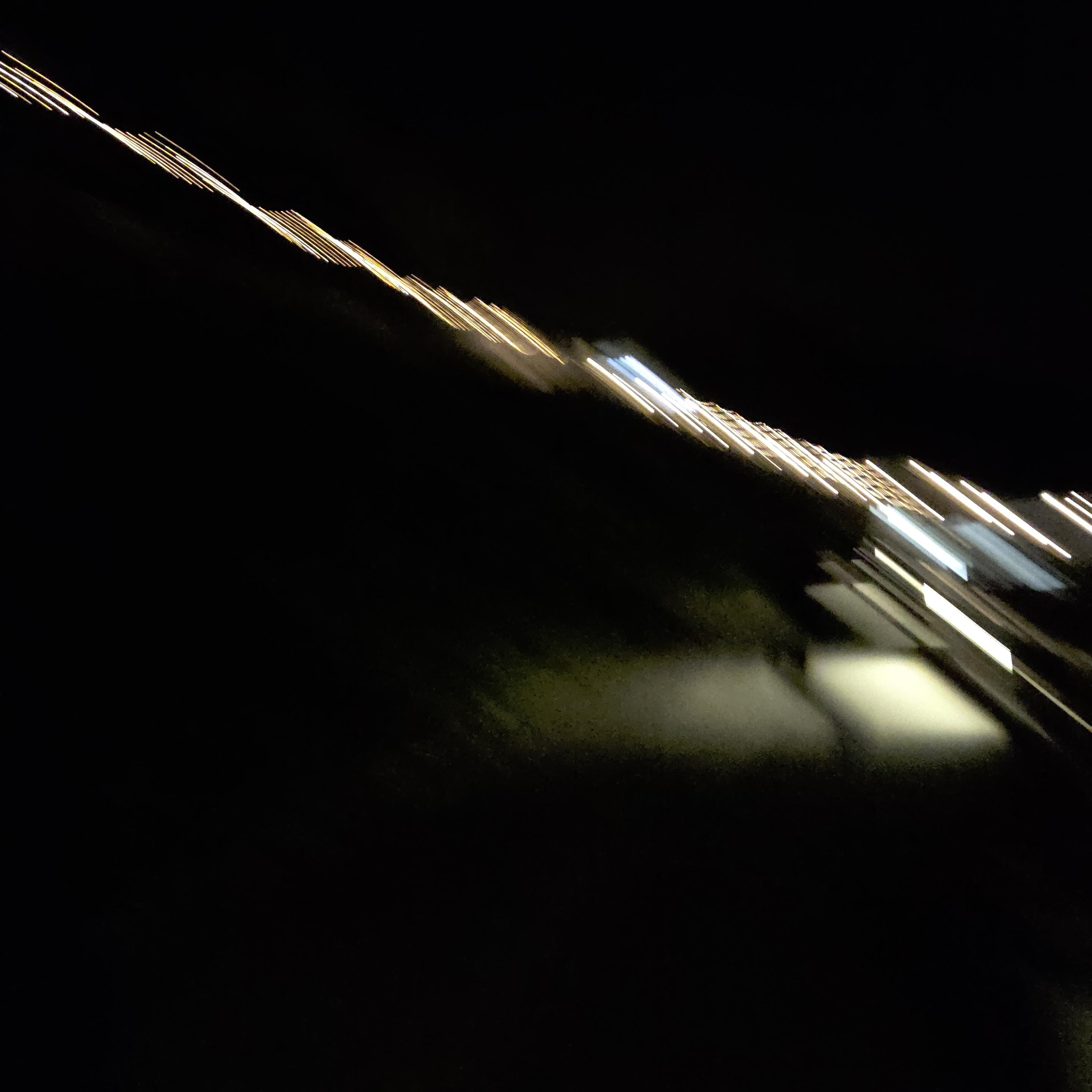Lines of light that go from the bottom right to the top left