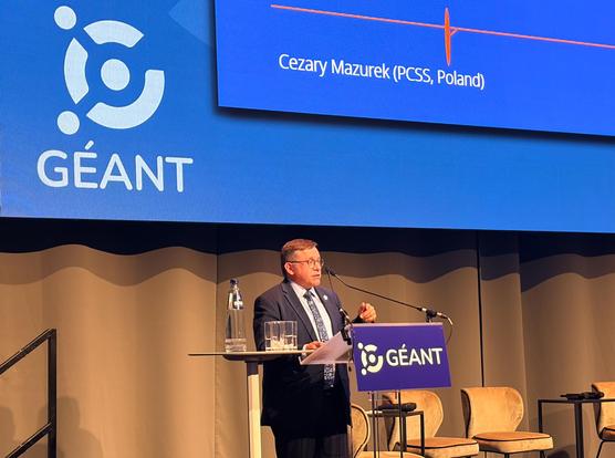 man presenting on stage